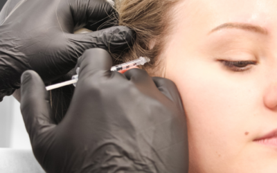 Dr. Injecting Botox® in temple